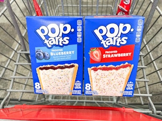 box of frosted blueberry and strawberry pop-tarts in shopping cart