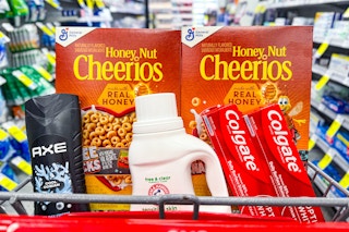 cheerios, axe body wash, arm & hammer detergent, and colgate toothpaste in a cart