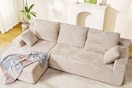 Lifestyle image of a beige cloud sofa in living room setting