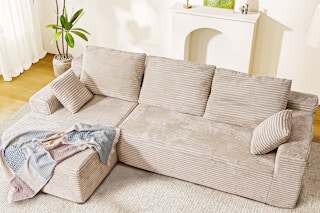Lifestyle image of a beige cloud sofa in living room setting