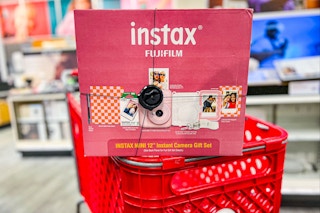 Instax Fujifil Camera Bundle Box on a Target shopping cart in the electronics area