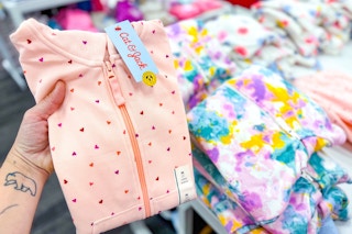 hand holding a cat & jack kids' sweatshirt at target