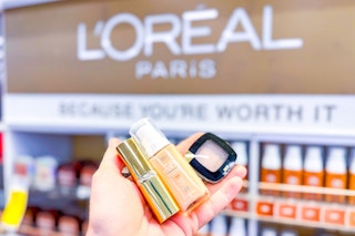 hand holding loreal cosmetics cvs