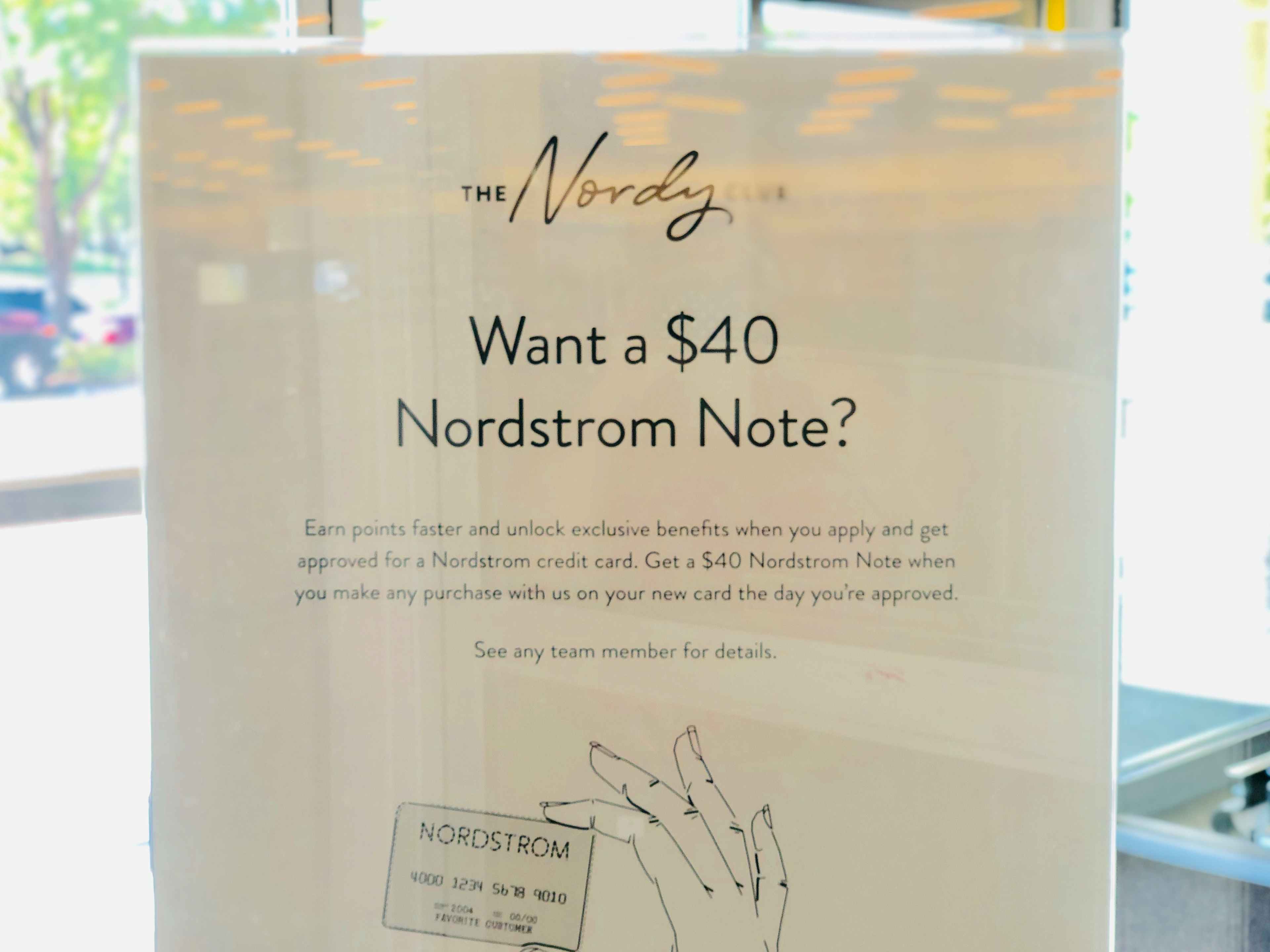 A sign for the promotional offer with the Nordstrom credit card.