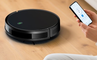 a robot vacuum and mop on hardwood floor
