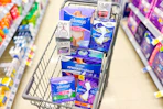 olay and always products in a walgreens shopping cart