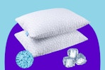 Tuozaiira Double Cooling Pillows Queen Size Set of 2 on a blue background.