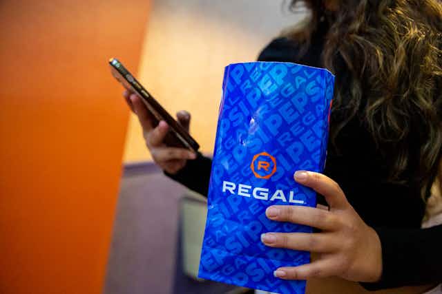 Understanding the Regal Unlimited Movie Pass card image