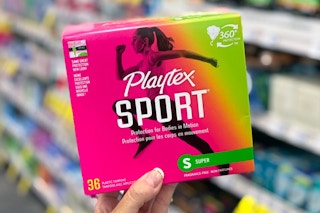 hand holding a box of playtex sport tampons