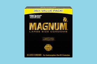 trojan magnum condoms on a light blue background