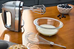 Lifestyle image of Kitchenaid hand mixer in kitchen setting