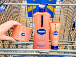3 vaseline products sitting in a walmart cart