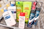 lubriderm, garnier, degree, and eucerin products in a cart
