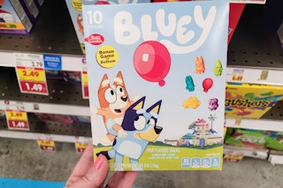 hand holding a box of betty crocker bluey fruit snacks at kroger