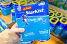 hand holding starkist tuna