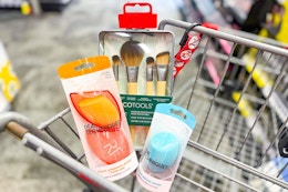 makeup sponges and brushes in a cart