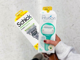 hand holding shick razors