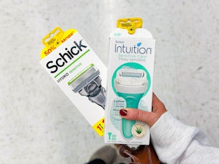 hand holding shick razors