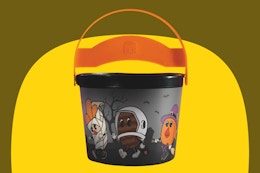 the 2025 burger king halloween bucket on a yellow and green background