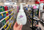hand holding dove hand soap in cvs