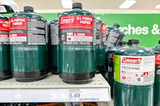 Coleman All-Purpose Propane Gas Cylinders sitting on a target shelf