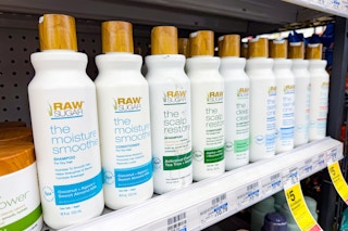 raw sugar shampoo and conditioner on a shelf