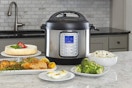  Instant Pot Duo Plus 9-in-1 Multicooker on a kitchen counter with food.