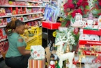 a woman shopping Dollar General black friday
