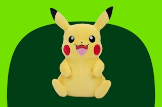 Pikachu plush on green background