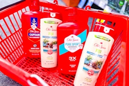 4 bottles of old spice body wash in a basket