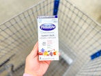 In-store photo taken of Pedialyte Electrolyte Powder (variety pack/8ct) held over Walmart shopping cart