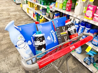 kleenex, febreze, u by kotex, and gillette shave foam in a cart