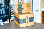 amazon boxes on a kitchen table
