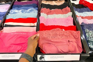 hand holding Victoria's Secret underwear