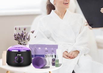 a waxing kit on a table next to a person