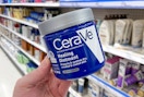 hand holding cerave healing ointment jar