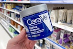 hand holding cerave healing ointment jar