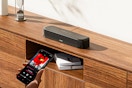 Lifestyle image of the ULTIMEA 5.1ch Sound Bar on furniture piece in home setting