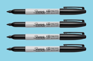 four Sharpie markers