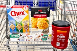 chobani flip yogurts, folgers coffee, chex cereal, and red lobster biscuit mix in a cart