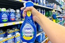 Dawn Powerwash held up in front of other Dawn products in Walmart store