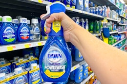 Dawn Powerwash held up in front of other Dawn products in Walmart store