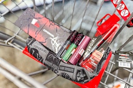 stranger things x covergirl makeup products in a cart