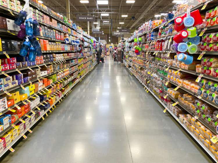 A fully stocked grocery store aisle.