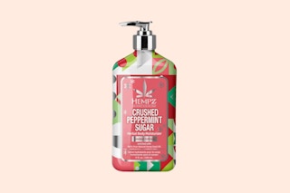 hempz body lotion on a peach background