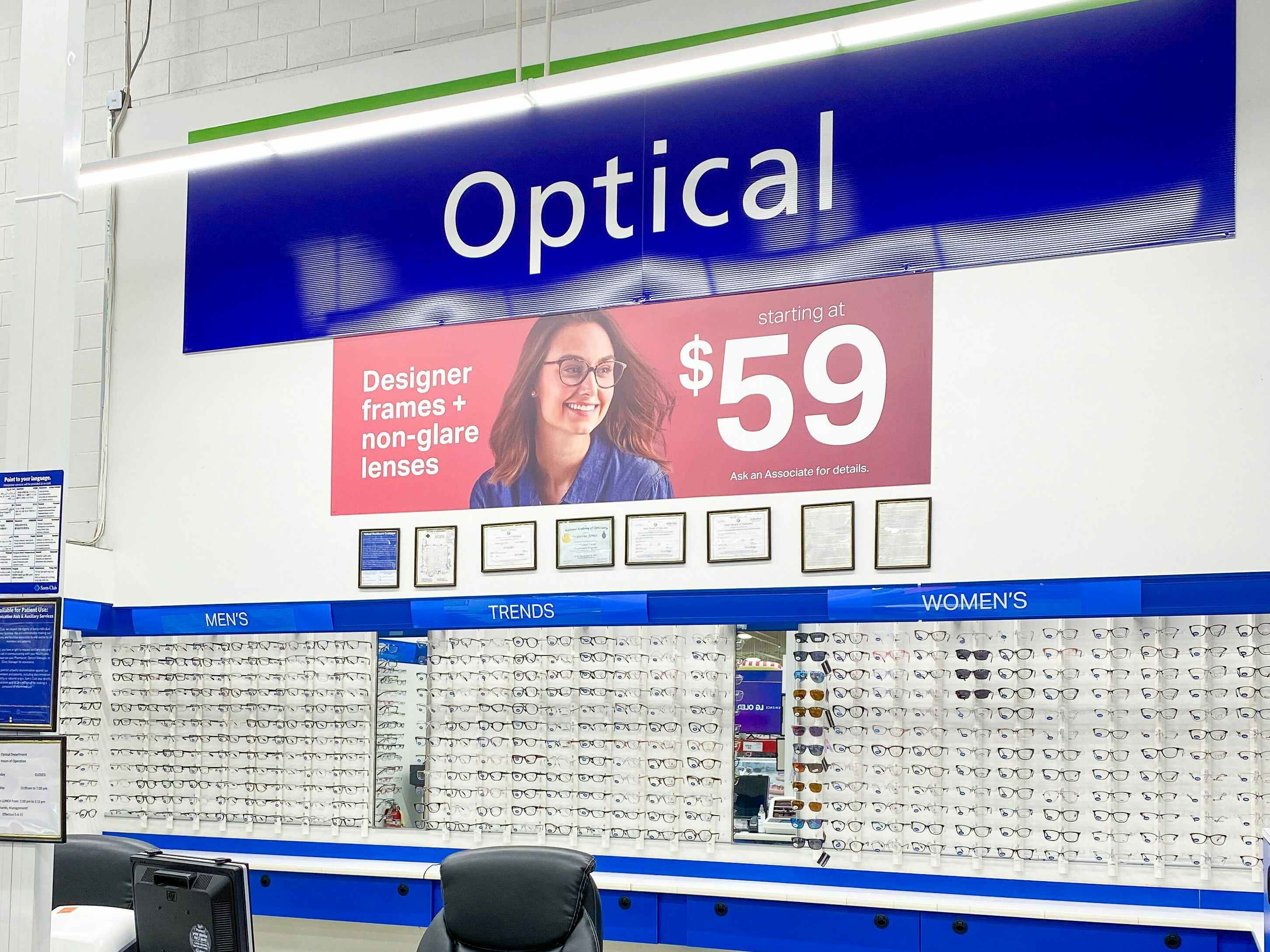Eye glasses on a display wall in the Optical center at Sam's Club.