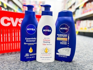 two bottles of Nivea body lotion and one bottle of body wash in aisle