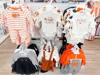 display of baby halloween outfits
