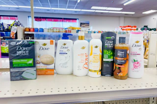 dove bar soaps and body washes on a shelf