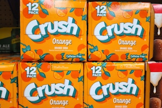 crush soda 12-packs stacked together